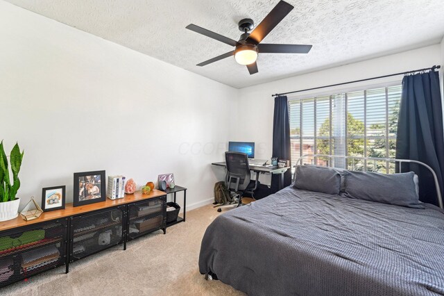 4006 Darby Park Rd, Hilliard, OH 43026 - carpeted bedroom with a textured ceiling, baseboards, and a ceiling fan