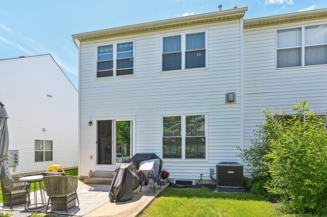 4006 Darby Park Rd, Hilliard, OH 43026 - back of house featuring central AC unit, a patio area, and entry steps