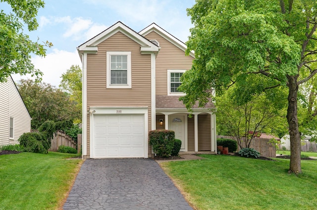 3162 Bowdoin Cir, Columbus, OH 43204 - traditional-style home featuring an attached garage and asphalt driveway