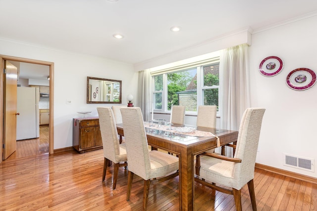2772 Dale Ave, Columbus, OH 43209 - dining space with light wood-style floors, baseboards, ornamental molding, and recessed lighting
