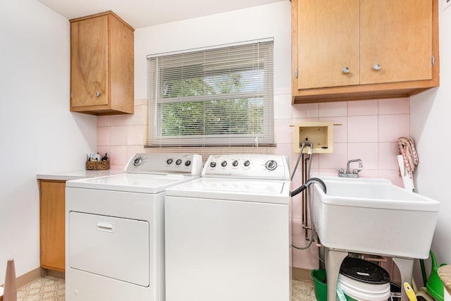 2772 Dale Ave, Columbus, OH 43209 - washroom featuring cabinet space and washer and clothes dryer