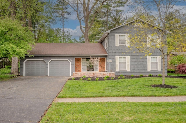 837 Cherry Bottom Rd, Columbus, OH 43230 - view of front of property featuring an attached garage, driveway, and a front yard