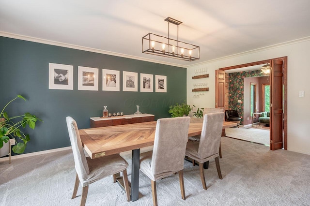 837 Cherry Bottom Rd, Columbus, OH 43230 - dining space featuring crown molding, light colored carpet, a chandelier, and baseboards