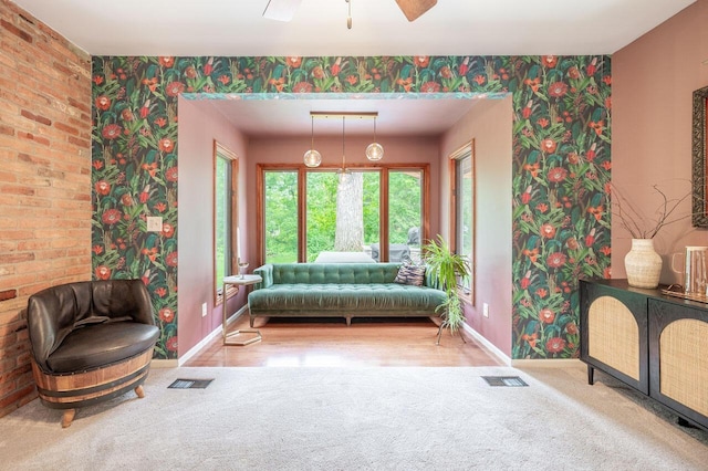 837 Cherry Bottom Rd, Columbus, OH 43230 - living area featuring baseboards, wallpapered walls, carpet flooring, and ceiling fan