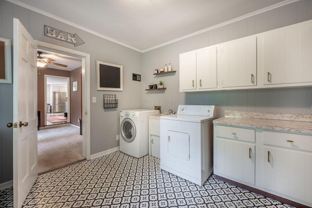 837 Cherry Bottom Rd, Columbus, OH 43230 - washroom featuring washing machine and clothes dryer, cabinet space, ornamental molding, ceiling fan, and baseboards