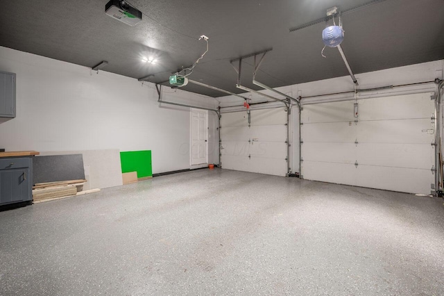 837 Cherry Bottom Rd, Columbus, OH 43230 - garage featuring a garage door opener