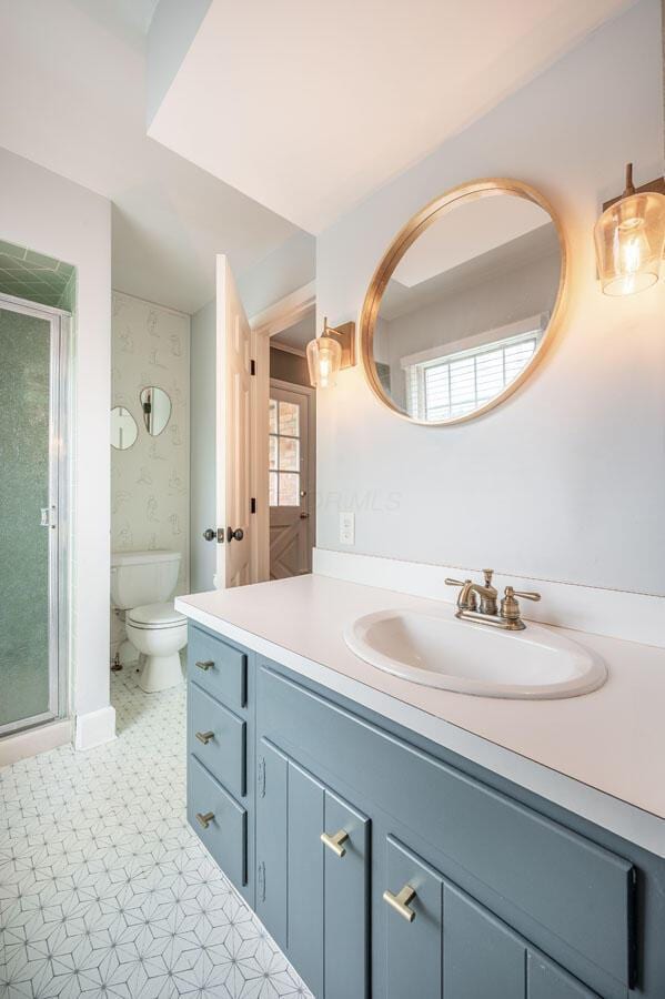 837 Cherry Bottom Rd, Columbus, OH 43230 - bathroom featuring vanity, toilet, and a shower stall