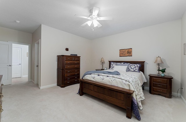 4502 Bens Ct Unit 31, Hilliard, OH 43026 - bedroom featuring light carpet, baseboards, and ceiling fan