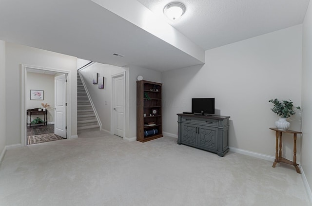 4502 Bens Ct Unit 31, Hilliard, OH 43026 - finished below grade area with light colored carpet, stairs, and baseboards