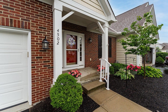 4502 Bens Ct Unit 31, Hilliard, OH 43026 - entrance to property featuring brick siding and a shingled roof