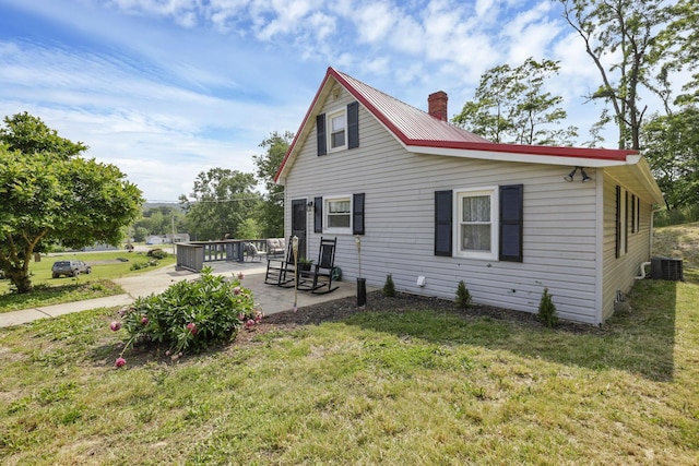 19616 N St, Laurelville, OH 43135 - back of property featuring a chimney, a yard, cooling unit, and a patio