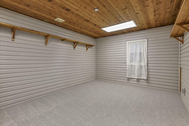 19616 N St, Laurelville, OH 43135 - carpeted empty room with wood ceiling and wooden walls