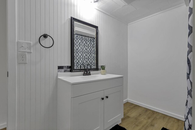 19616 N St, Laurelville, OH 43135 - full bath featuring wood finished floors, vanity, and baseboards
