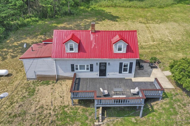 19616 N St, Laurelville, OH 43135 - back of property featuring a chimney, a deck, stairs, and metal roof