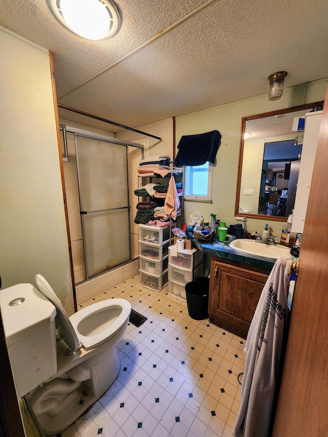 6960 Bluebell Rd, Cumberland, OH 43732 - full bath with toilet, a stall shower, vanity, and a textured ceiling