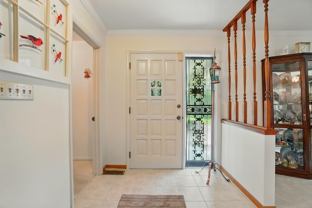 8430 Patterson Rd, Hilliard, OH 43026 - entryway with baseboards, crown molding, and light tile patterned floors