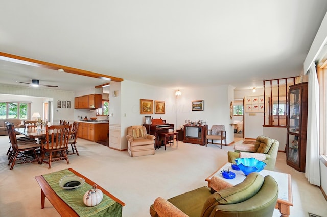 8430 Patterson Rd, Hilliard, OH 43026 - living room featuring light carpet, healthy amount of natural light, and a ceiling fan