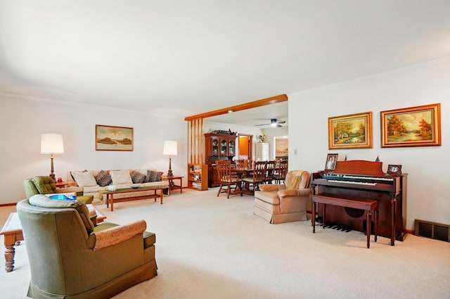 8430 Patterson Rd, Hilliard, OH 43026 - carpeted living room with ornamental molding and ceiling fan