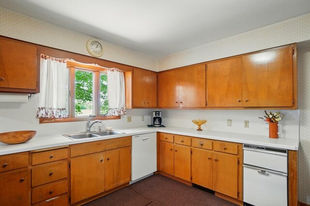 8430 Patterson Rd, Hilliard, OH 43026 - kitchen featuring white dishwasher, a sink, light countertops, brown cabinetry, and wallpapered walls