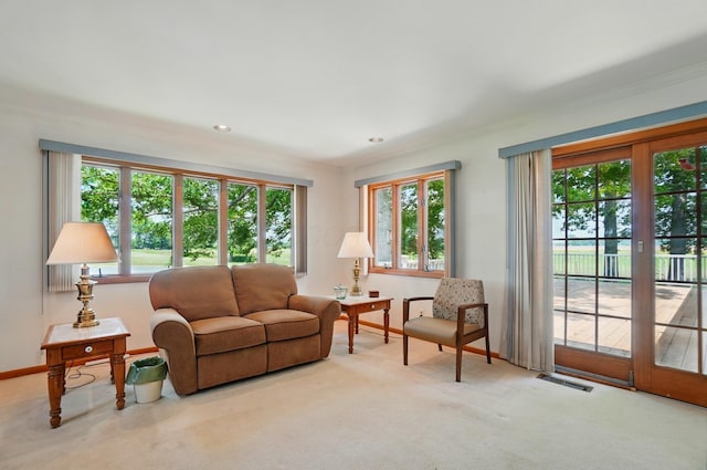 8430 Patterson Rd, Hilliard, OH 43026 - carpeted living room featuring baseboards, ornamental molding, and recessed lighting
