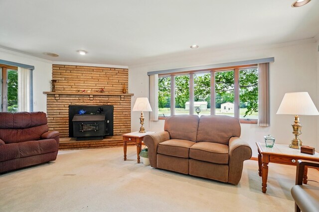 8430 Patterson Rd, Hilliard, OH 43026 - carpeted living area featuring crown molding, a fireplace, and recessed lighting