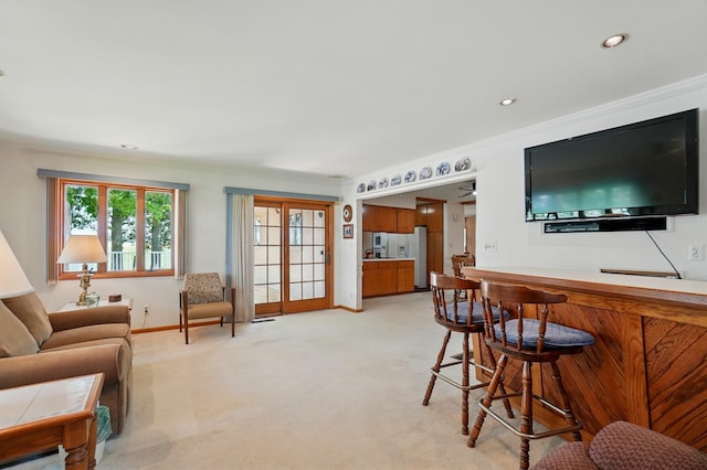 8430 Patterson Rd, Hilliard, OH 43026 - living room featuring ornamental molding, light colored carpet, recessed lighting, and baseboards