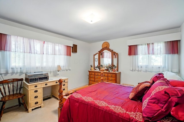 8430 Patterson Rd, Hilliard, OH 43026 - bedroom with multiple windows, light carpet, and a desk