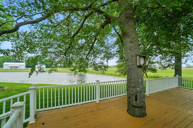 8430 Patterson Rd, Hilliard, OH 43026 - wooden deck with a water view and a yard