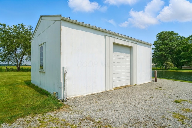 8430 Patterson Rd, Hilliard, OH 43026 - detached garage with a water view and driveway