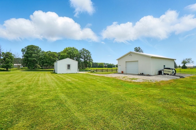 8430 Patterson Rd, Hilliard, OH 43026 - view of yard with an outdoor structure and a detached garage