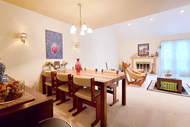 4760 Coach Rd Unit 14, Columbus, OH 43220 - dining space featuring a chandelier, recessed lighting, a glass covered fireplace, and light carpet