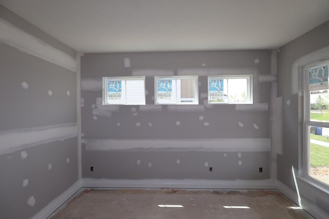 6946 Stillhouse Ln, Dublin, OH 43016 - spare room featuring plenty of natural light and baseboards