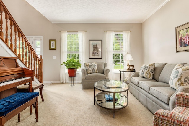 2545 Bryton Dr, Powell, OH 43065 - living room featuring carpet flooring, healthy amount of natural light, a textured ceiling, stairway, and ornamental molding