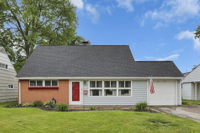 2971 Wendy Ln, Grove City, OH 43123 - view of front of property with asphalt driveway, a garage, a shingled roof, a front lawn, and brick siding
