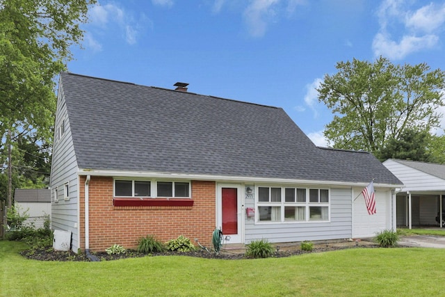 2971 Wendy Ln, Grove City, OH 43123 - view of front of property with brick siding, a front lawn, a shingled roof, and a garage
