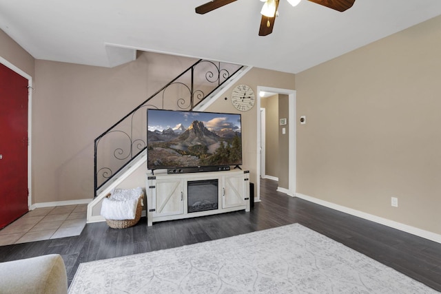 2971 Wendy Ln, Grove City, OH 43123 - living room with stairway, a ceiling fan, wood finished floors, and baseboards