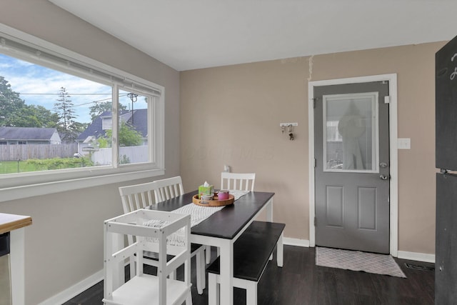 2971 Wendy Ln, Grove City, OH 43123 - dining space with dark wood-style floors and baseboards