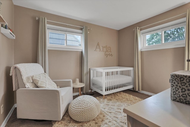 2971 Wendy Ln, Grove City, OH 43123 - bedroom featuring a nursery area, radiator, and baseboards