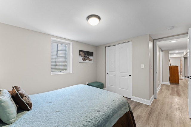 3531 Colchester Rd, Upper Arlington, OH 43221 - bedroom with light wood-style flooring, a closet, and baseboards