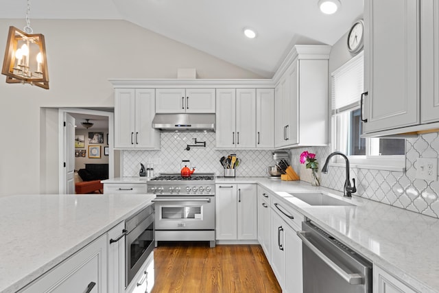 3531 Colchester Rd, Upper Arlington, OH 43221 - kitchen featuring stainless steel appliances, extractor fan, a sink, lofted ceiling, and white cabinets