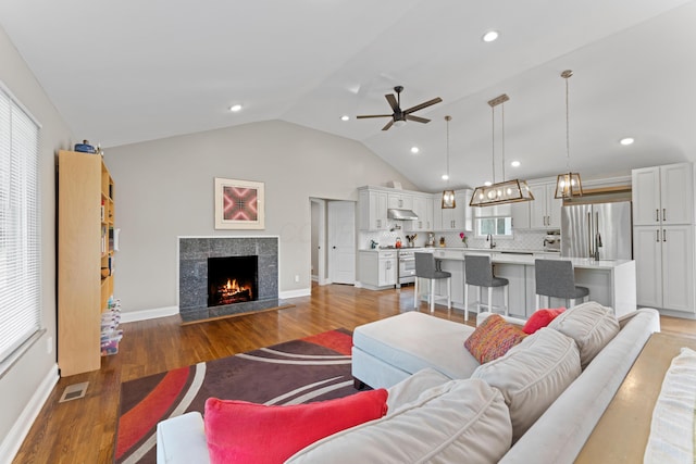 3531 Colchester Rd, Upper Arlington, OH 43221 - living area featuring a ceiling fan, wood finished floors, lofted ceiling, a fireplace, and recessed lighting