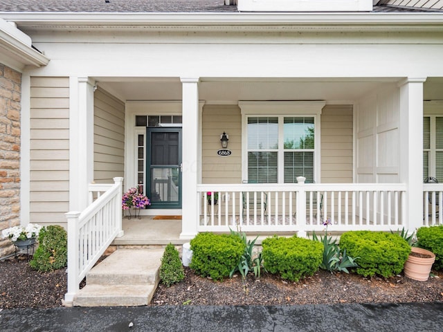 6868 Beltain Ln Unit 37B, Dublin, OH 43016 - entrance to property featuring a porch and roof with shingles