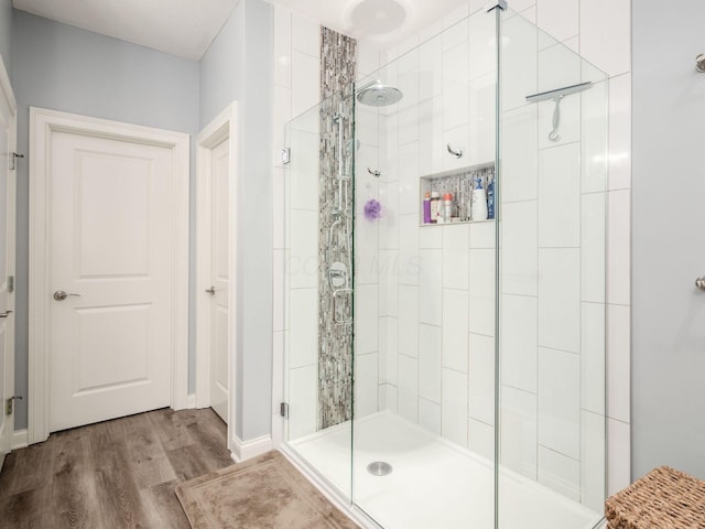 6868 Beltain Ln Unit 37B, Dublin, OH 43016 - bathroom with a shower stall, wood finished floors, and baseboards