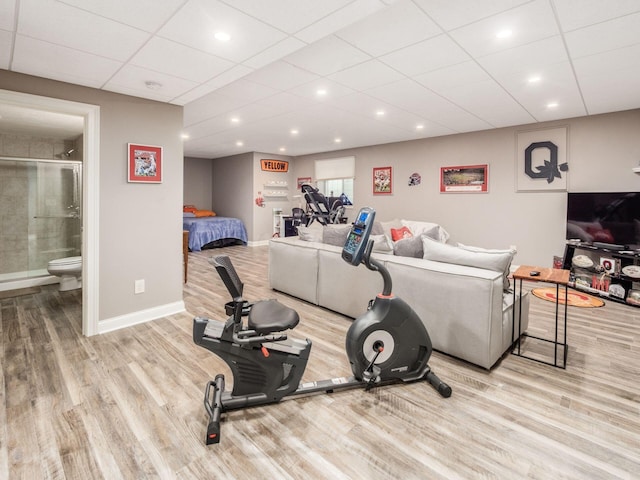 6868 Beltain Ln Unit 37B, Dublin, OH 43016 - workout room with wood finished floors, a drop ceiling, and baseboards