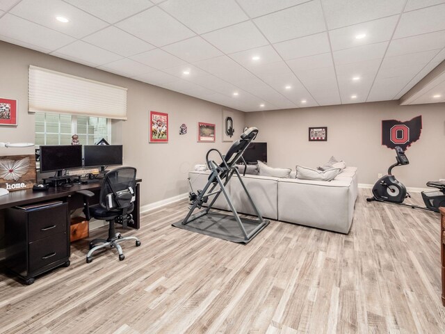 6868 Beltain Ln Unit 37B, Dublin, OH 43016 - workout area with light wood-style flooring, baseboards, recessed lighting, and a drop ceiling