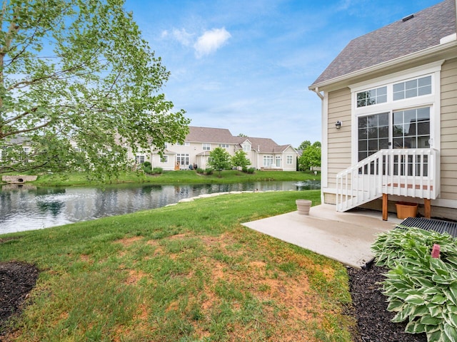6868 Beltain Ln Unit 37B, Dublin, OH 43016 - view of green lawn with a water view, a patio area, and a residential view
