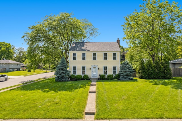 3985 Glenda Pl, Upper Arlington, OH 43220 - colonial inspired home featuring a chimney