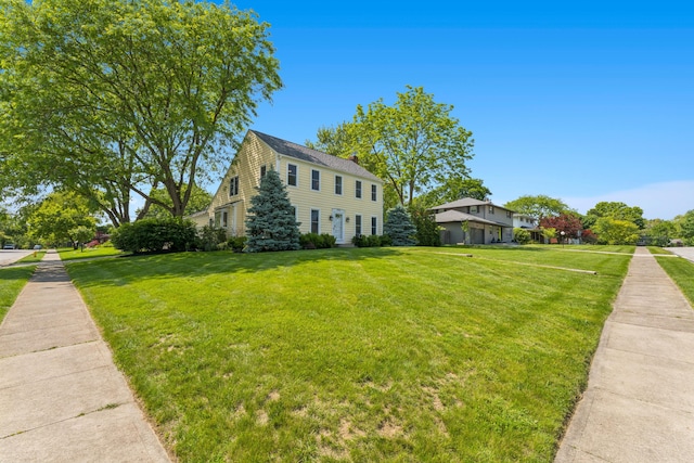 3985 Glenda Pl, Upper Arlington, OH 43220 - view of front of house with a front yard