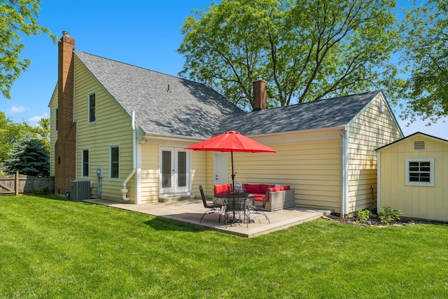 3985 Glenda Pl, Upper Arlington, OH 43220 - rear view of property with a chimney, roof with shingles, french doors, and a patio