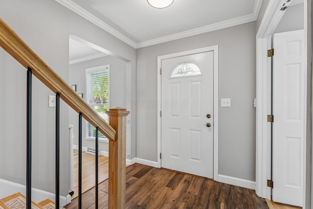 3985 Glenda Pl, Upper Arlington, OH 43220 - entryway featuring crown molding, wood finished floors, and baseboards
